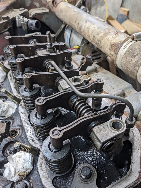 Rough running tractor... Broken rocker arm Homesteading Drive On Wood!